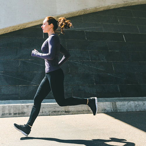 woman running doing cardio
