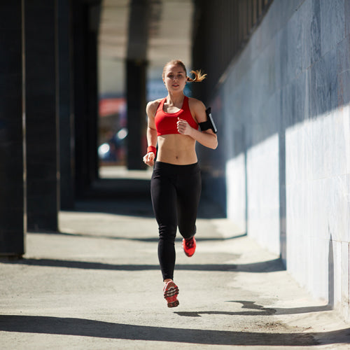 a female runner is running