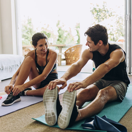 couples are working out at home